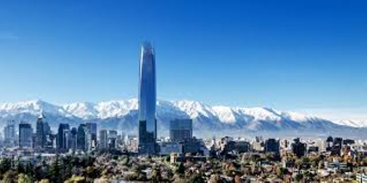 The Gran Torre skyscraper and the Andes in Santiago